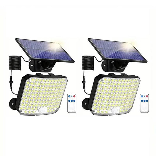 Solar LED motion sensor flood light set with two fixtures, solar panels, and remote controls