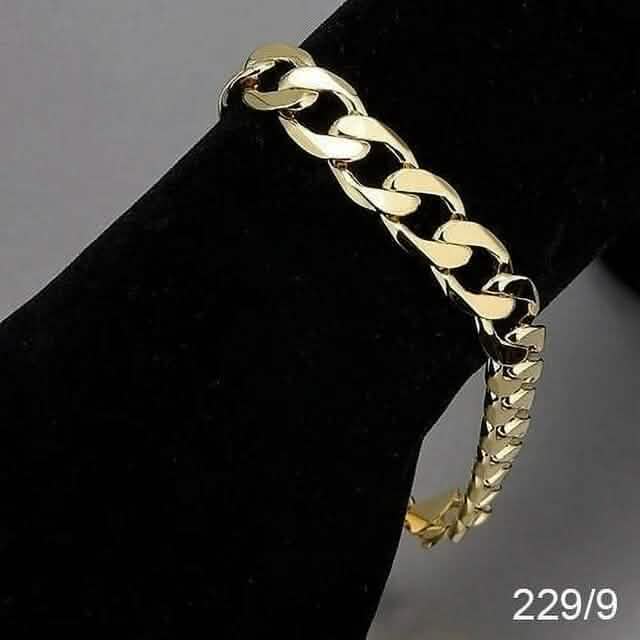 14K gold curb bracelet, polished link chain with clasp