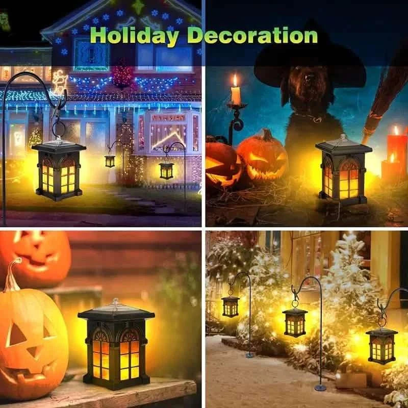 Holiday outdoor solar lantern with warm yellow flame glow behind glass, dark gray on display