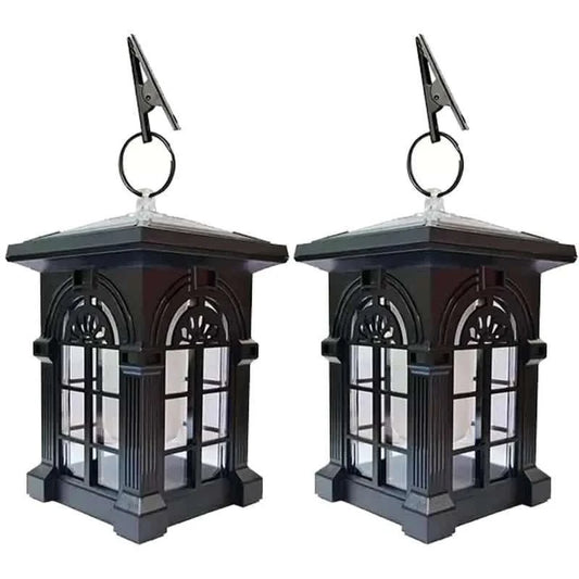 Solar flame-effect outdoor lanterns, dark gray with clear panels and hanging loops (no flames)