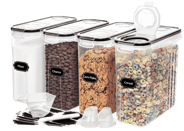 Four transparent airtight cereal containers with pour spouts, measuring cup, and labels