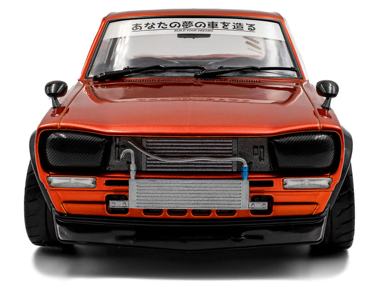 1970 Nissan Skyline (C10) Hakosuka RHD (Right Hand Drive) Orange Metallic 1/18 Diecast Model Car by Solido Miniature Motors Default Title Default Title-