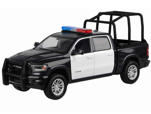 Black and white diecast pickup truck model with roof light bar and bed cage