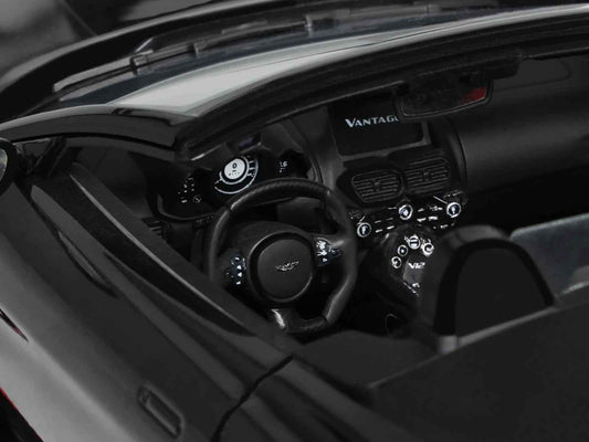 Black steering wheel and dashboard of V12 Vantage roadster model car