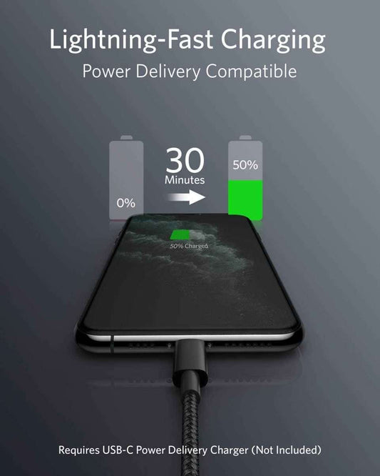 Black USB-C to Lightning cable connected to a smartphone, braided connector ends