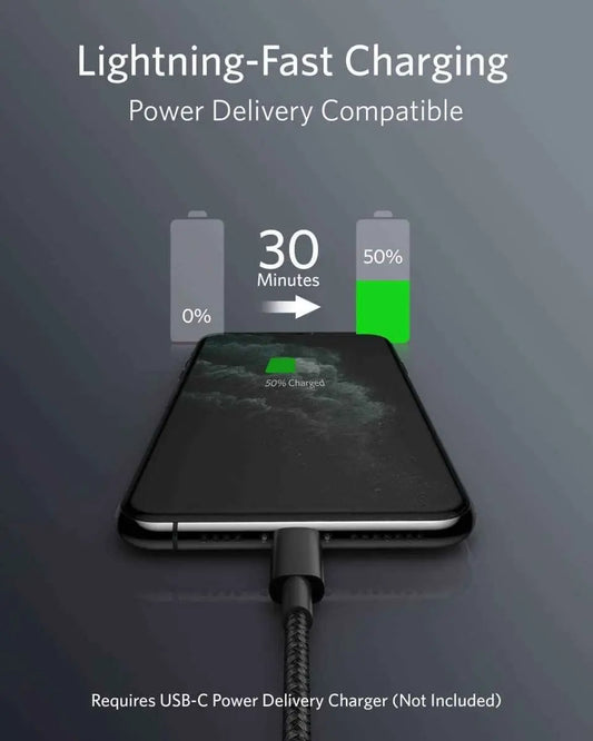 Black USB-C to Lightning cable connected to a smartphone, braided connector ends