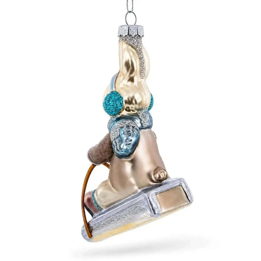 Bunny Sledding with Earmuffs Glass Christmas Ornament Cartsfy Inc.