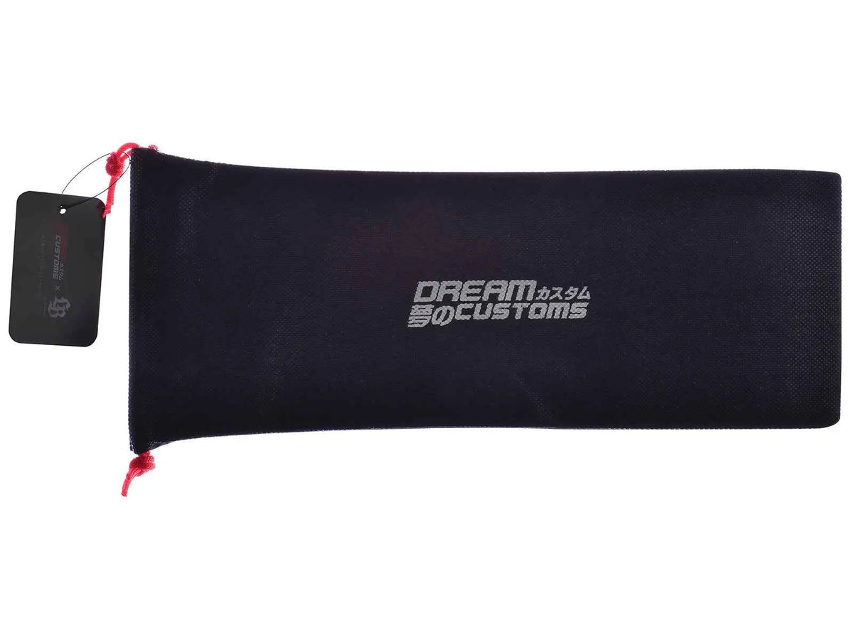 Black desktop display mat with Dream Customs logo, red drawstring tie and hang tag