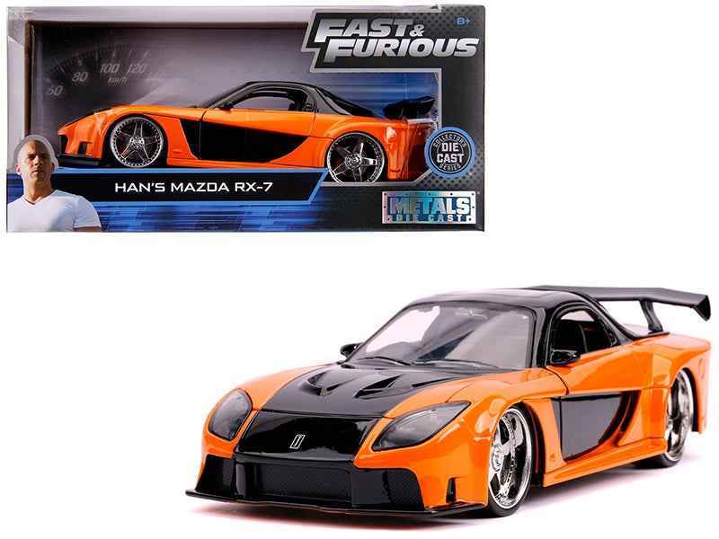 Orange and black die-cast RX-7 RHD model car, front three-quarter view