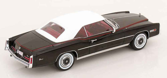 Black convertible model car with red interior, white pinstripe, side view, chrome wheels