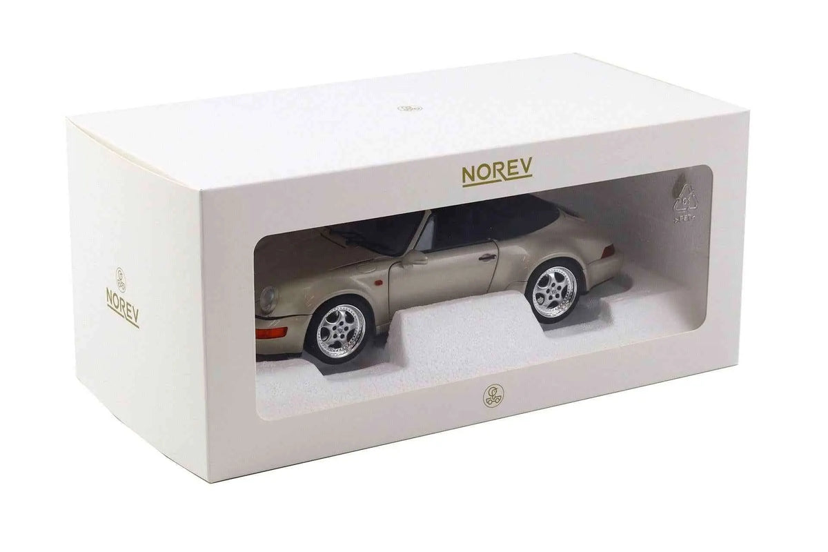 Norev die-cast model car in display box, silver convertible with black interior