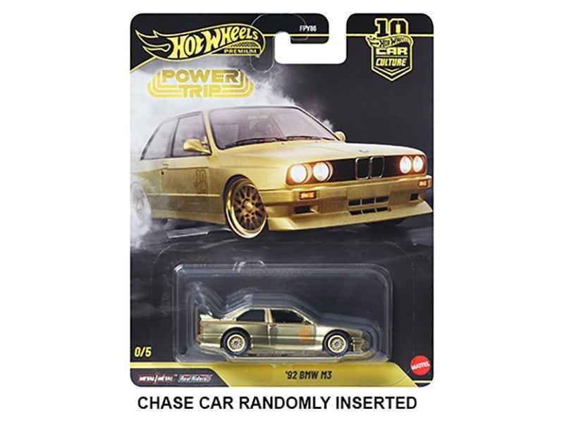 Hot Wheels diecast model car, gold BMW with black grille, carded blister