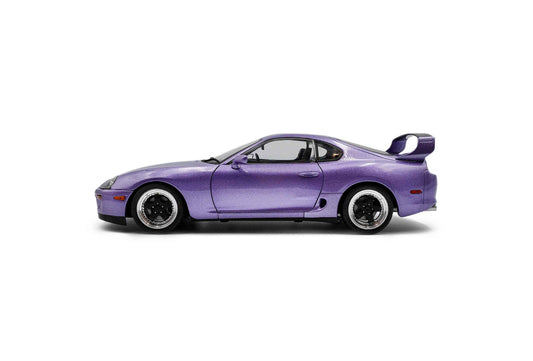 Purple 1:18 scale die-cast sports car in side profile with black wheels