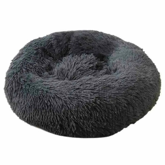 Dark gray plush round pet bed with raised cushioned rim and center hollow