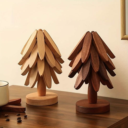 Tree-shaped wooden coaster set: one light and one dark on round bases.
