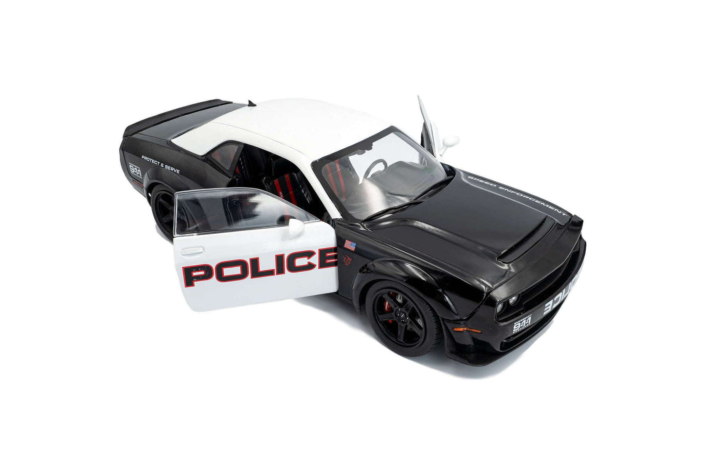 Black-and-white police die-cast car model, angled front view with POLICE