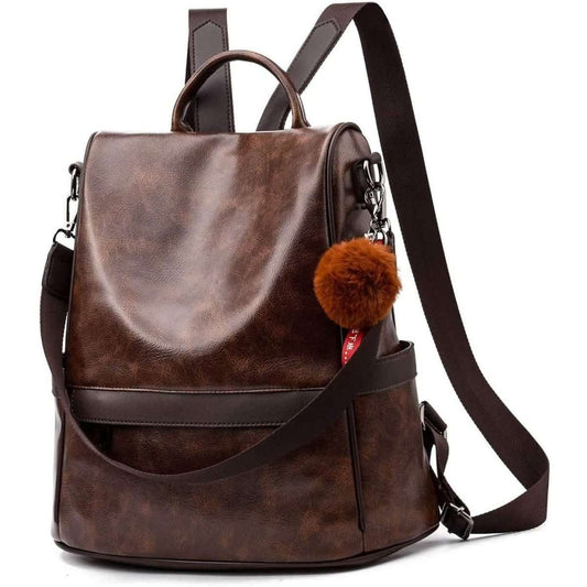 Brown women backpack purse with pom-pom charm, top handles and adjustable crossbody strap