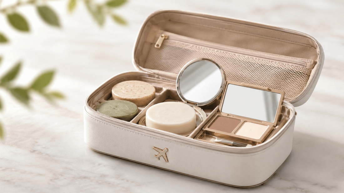 A stylish travel beauty kit featuring a compact case with various skincare and makeup products, including soaps, a mirror, and a dual-tone powder, all neatly organized inside.
