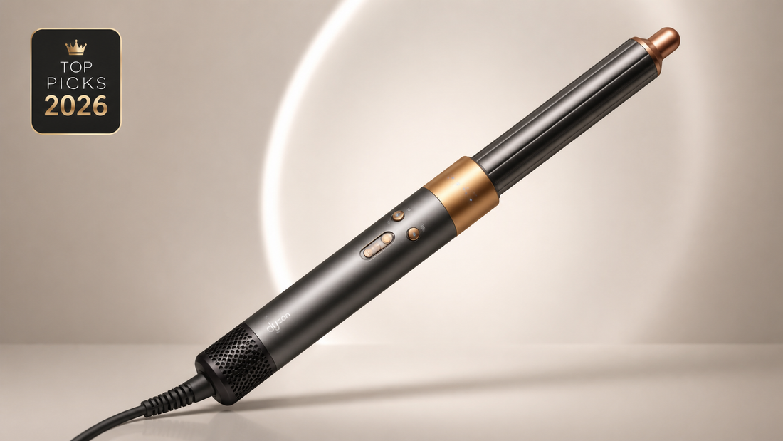 A sleek curling wand with a black and gold design, featuring buttons for temperature control, set against a soft, neutral background with a circular light reflection, highlighting its modern aesthetic.