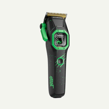 Hair clipper, black body with green accents and side lever, blade facing forward.