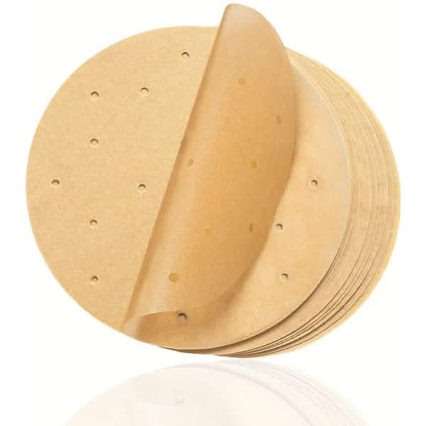 Brown round air-fryer parchment papers, perforated holes, stacked (100 pcs)