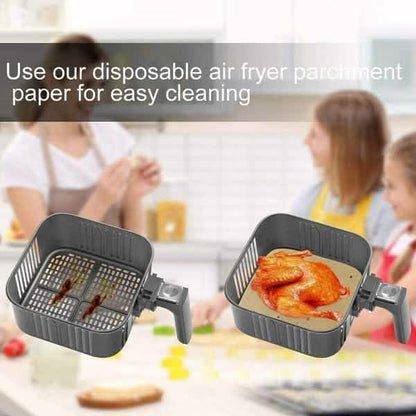 Round air fryer parchment paper liners in black basket, disposable nonstick sheet