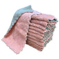 Stack of kitchen dish towels in pastel tones: light blue and pink