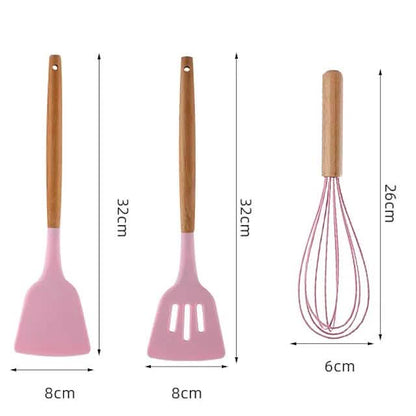 Pink silicone spatula with wood handle and sizing diagram for head and length