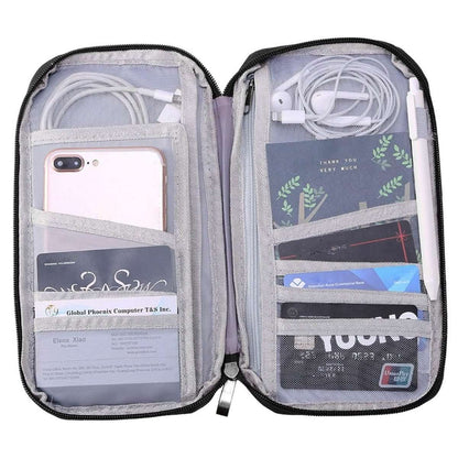 Open gray-lined passport wallet with phone slot, document pockets, and white cables.