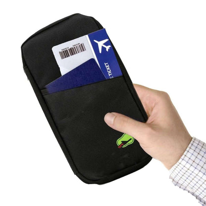 Black travel passport wallet holding a boarding pass in front slot, green logo.