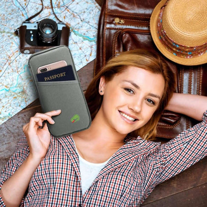 Dark green travel passport wallet with passport sleeve and card pocket windows