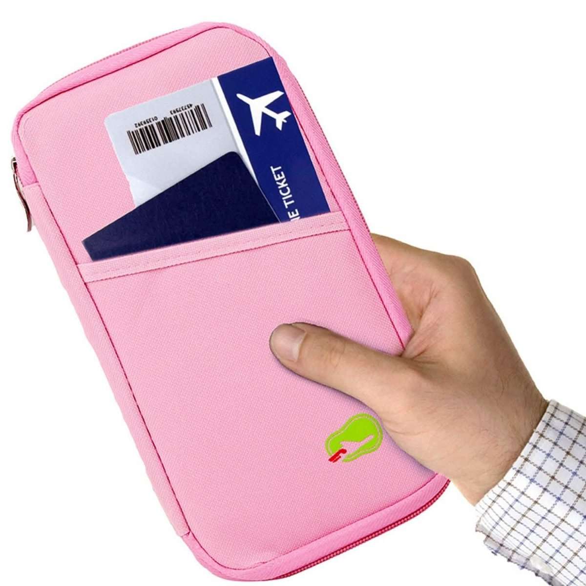 Pink passport wallet held by hand with card slot and ID pocket visible