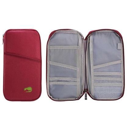 Red passport wallet opened to show multiple fabric card compartments and zip divider
