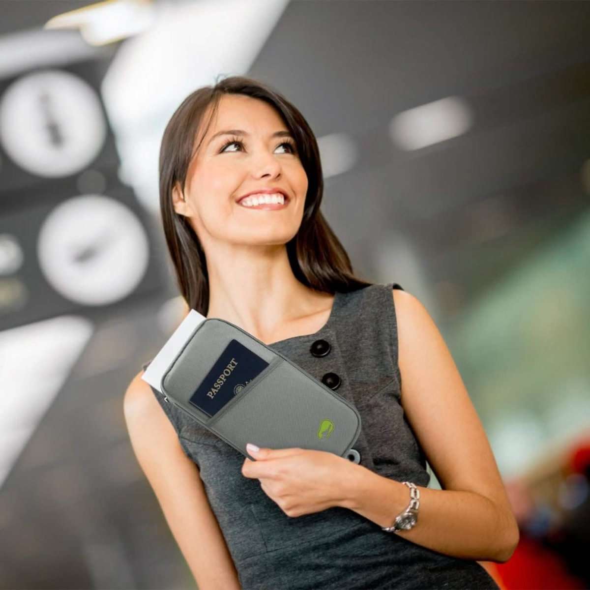 Dark gray travel passport wallet with passport sleeve and small exterior emblem
