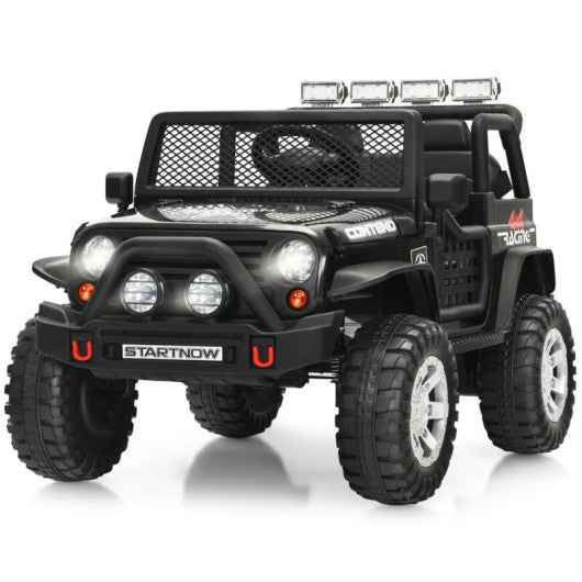 Kids black electric ride-on truck with LED headlights, front grille, big off-road tires