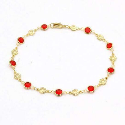 Gold-tone anklet bracelet with red crystal beads and small flower charms
