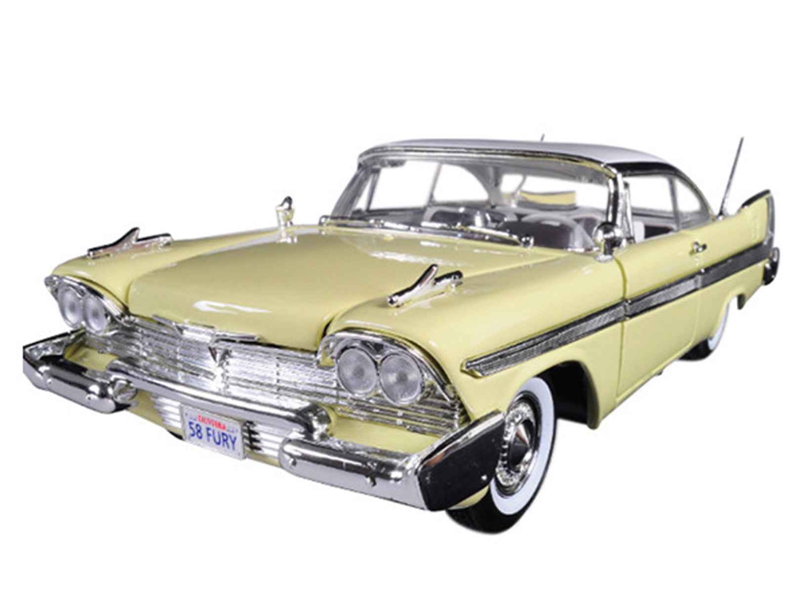 1:18 diecast model car, yellow with white roof, front three-quarter view