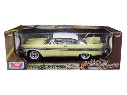 1:18 diecast model car in display box, yellow with white roof, side view