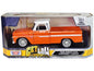 Orange/white 1966 Chevy C10 Fleetside diecast pickup truck, front view