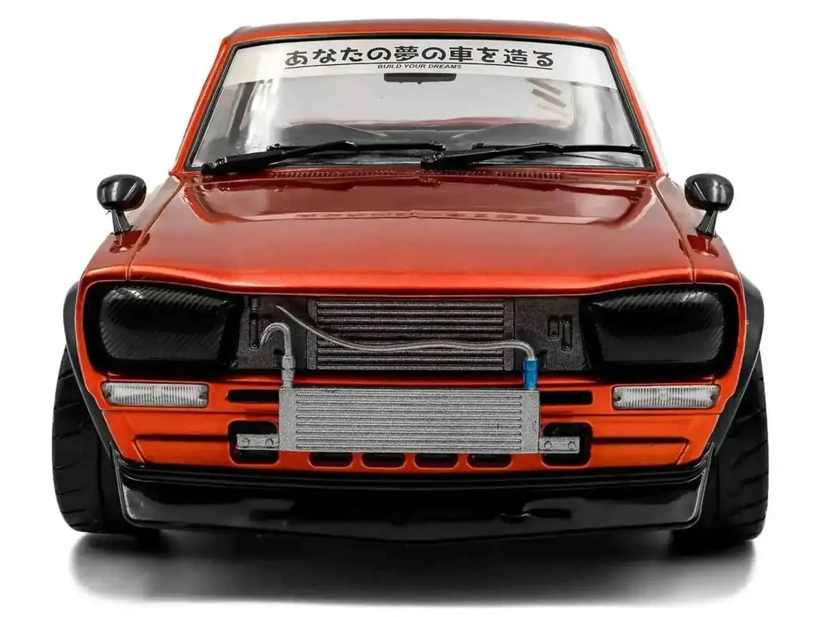 1970 Nissan Skyline (C10) Hakosuka RHD (Right Hand Drive) Orange Metallic 1/18 Diecast Model Car by Solido Cartsfy Inc.