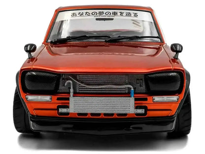 1970 Nissan Skyline (C10) Hakosuka RHD (Right Hand Drive) Orange Metallic 1/18 Diecast Model Car by Solido Cartsfy Inc.