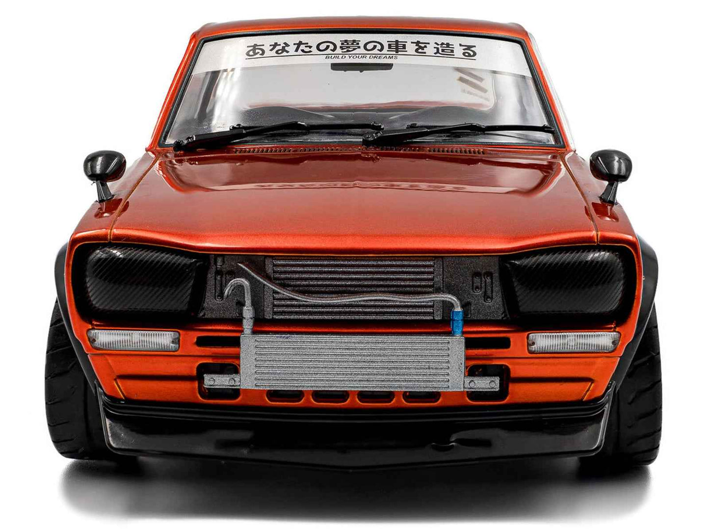 1970 Nissan Skyline (C10) Hakosuka RHD (Right Hand Drive) Orange Metallic 1/18 Diecast Model Car by Solido Cartsfy Inc.