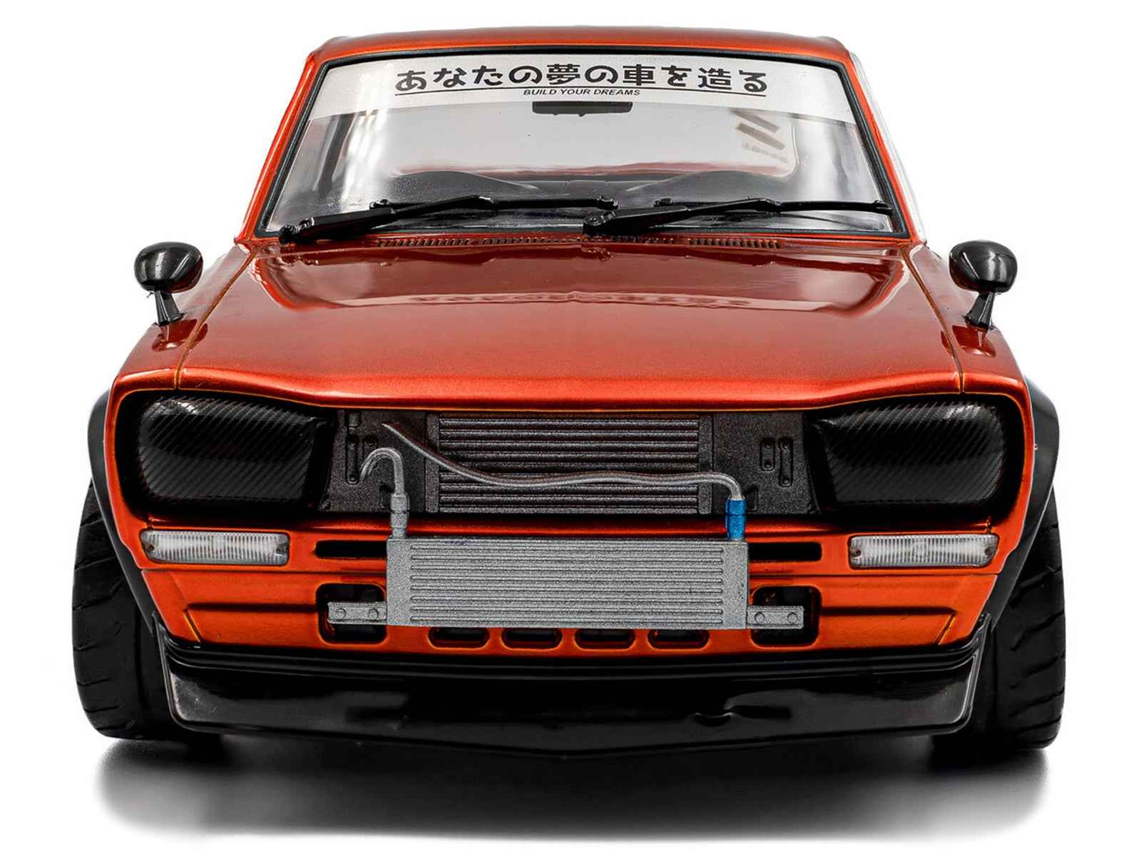 1970 Nissan Skyline (C10) Hakosuka RHD (Right Hand Drive) Orange Metallic 1/18 Diecast Model Car by Solido Cartsfy Inc.