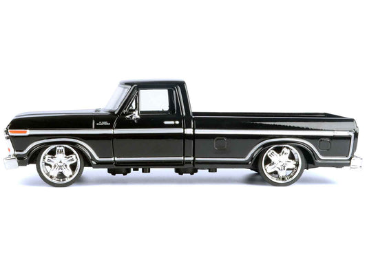 1/24 diecast pickup truck, black with chrome wheels and detailed front grille