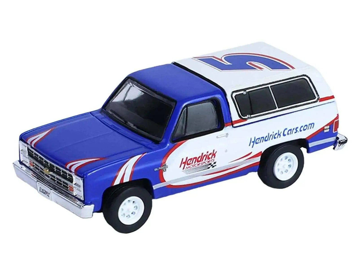 1986 Chevrolet K5 Blazer Blue and White and 1969 Chevrolet Camaro #5 Blue and White "Kyle Larson - Hendrick Motorsports" with Tandem Car Trailer "Racing Hitch & Tow" Series 6 1/64 Diecast Model Cars by Greenlight Miniature Motors Default Title Default Title-