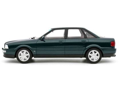 1993 Audi S2 sedan model car, emerald green metallic, side profile, white-spoke wheels