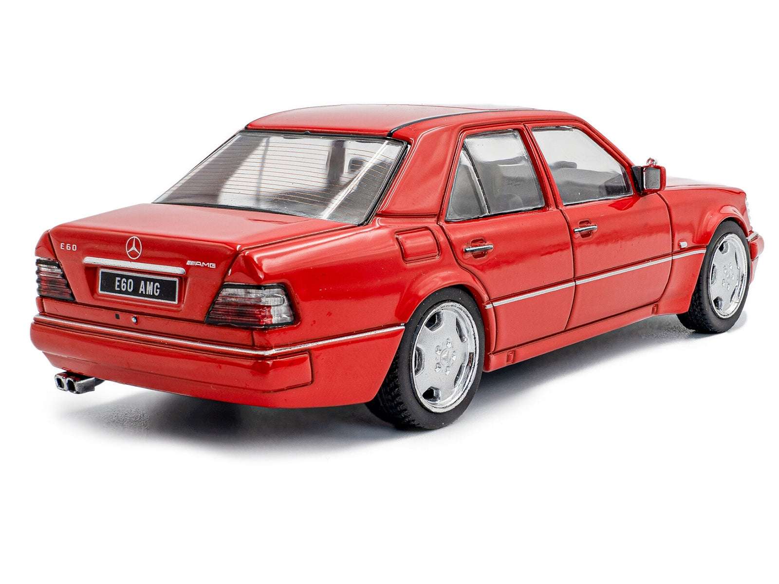Red diecast E60 AMG sedan model car, rear three-quarter view with chrome bumper