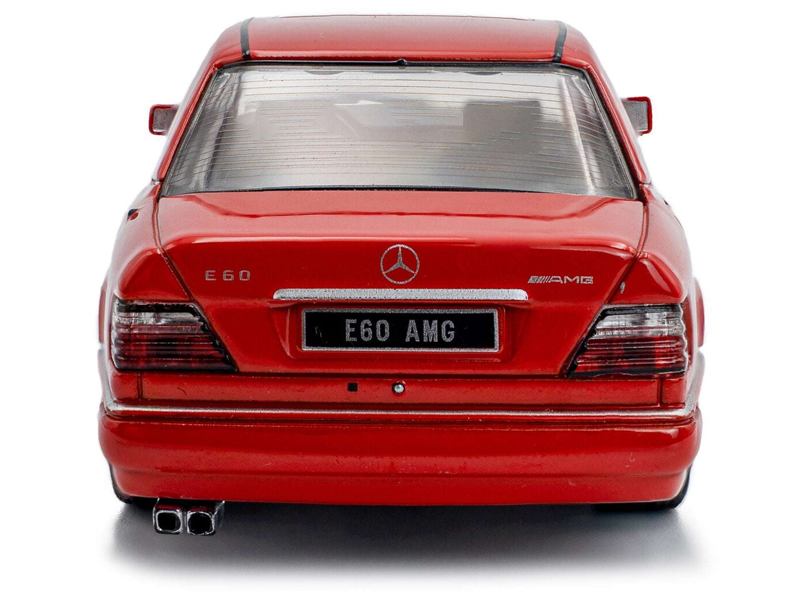 Red diecast E60 AMG sedan model car, rear view with E60 AMG badge and exhaust tips