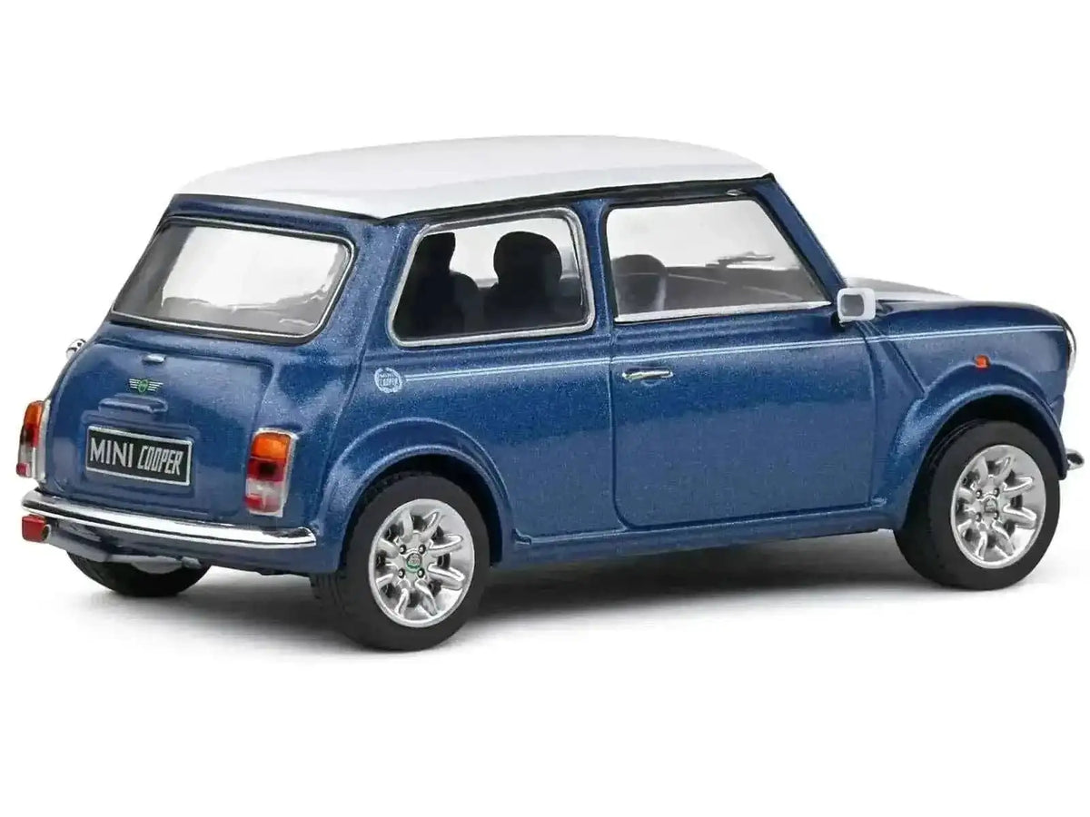 1994 Mini Cooper Sport Tahiti Blue Metallic with White Top and Stripes 1/43 Diecast Model Car by Solido Cartsfy Inc.