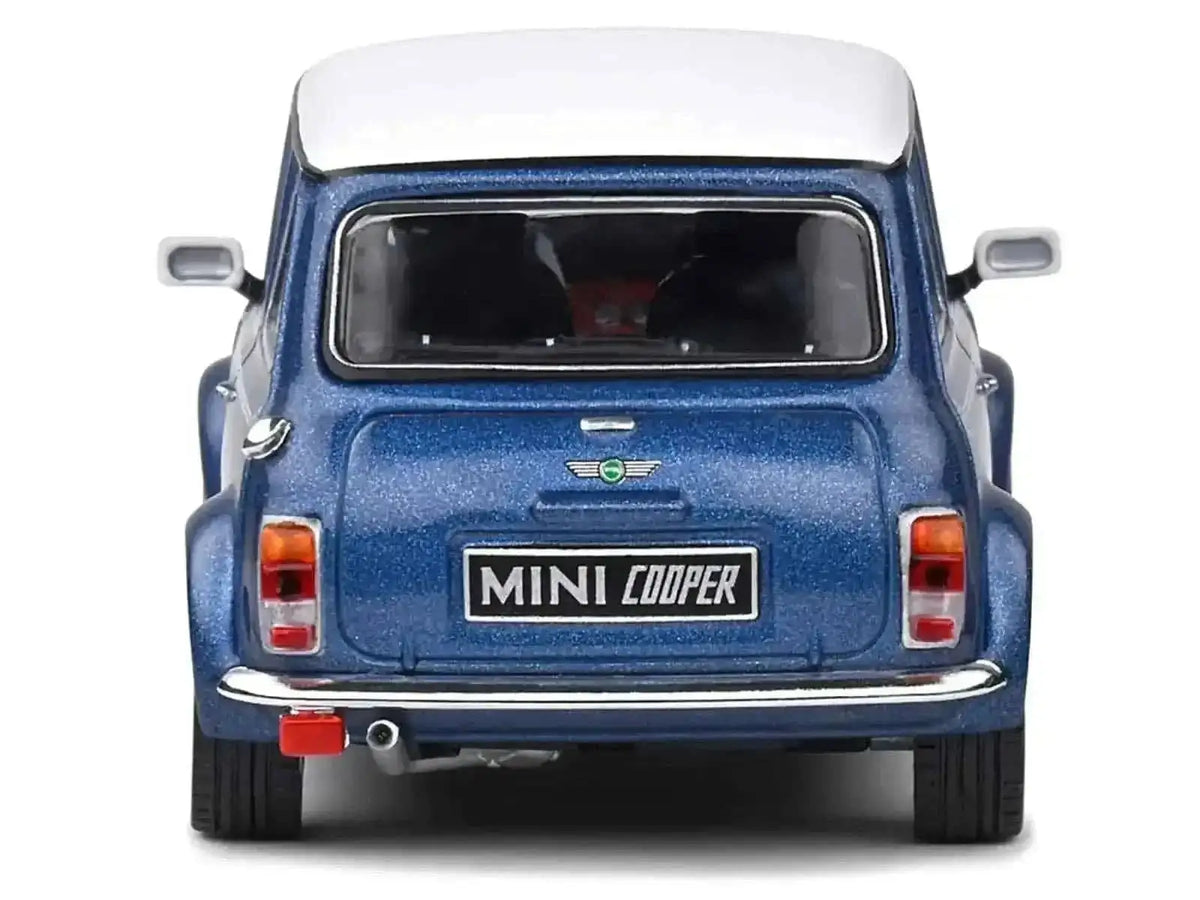 1994 Mini Cooper Sport Tahiti Blue Metallic with White Top and Stripes 1/43 Diecast Model Car by Solido Cartsfy Inc.